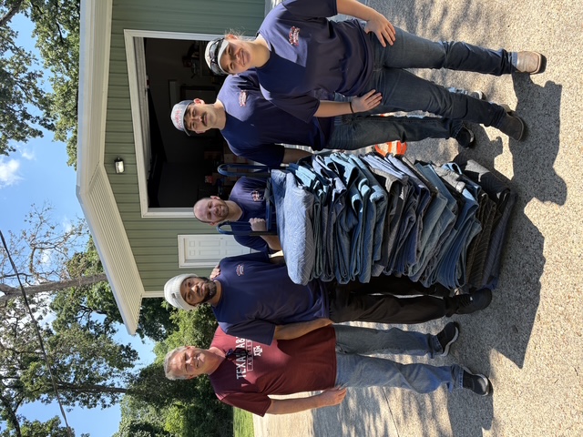 The Maltese Movers crew on a moving job in College Station, TX